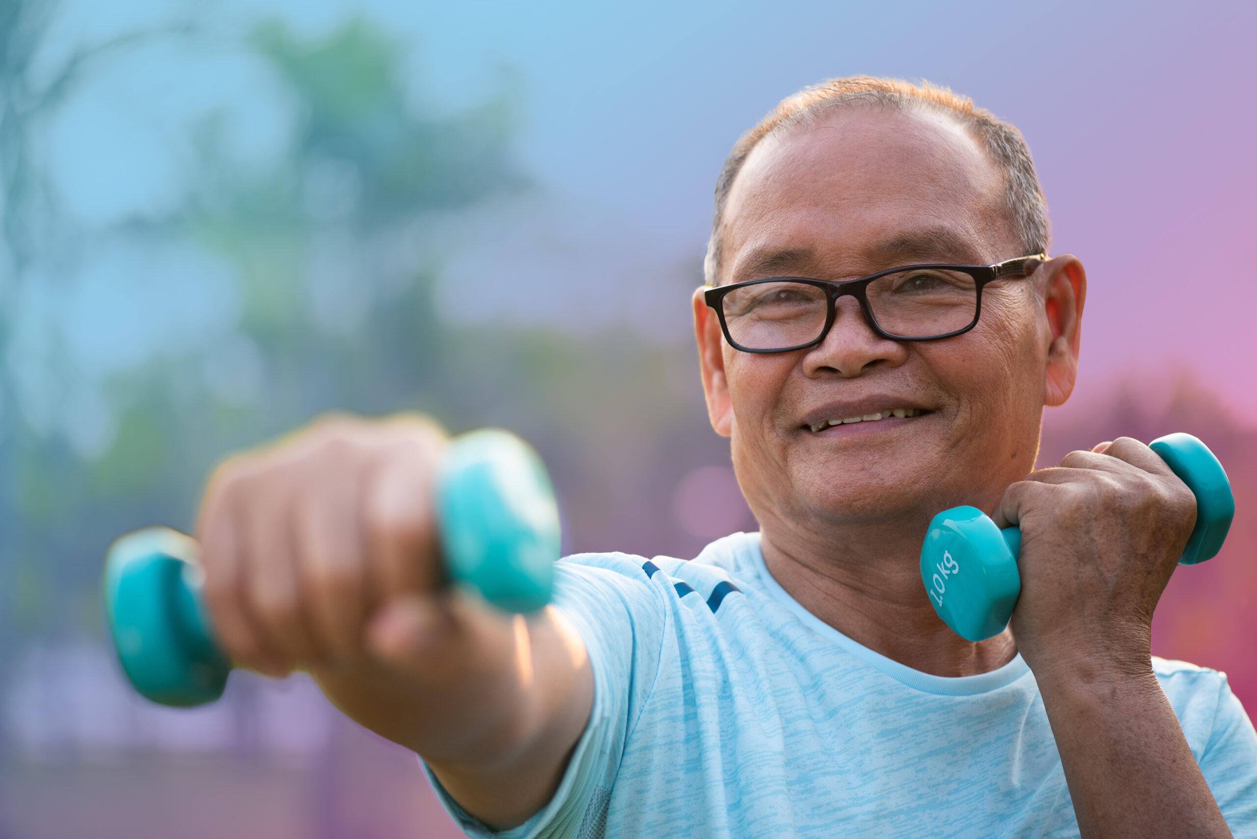 A man exercises using hand weights